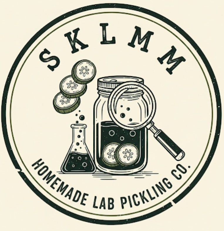 Logo of Homemade Lab Pickling Co. with a jar, magnifying glass, and cucumbers.
